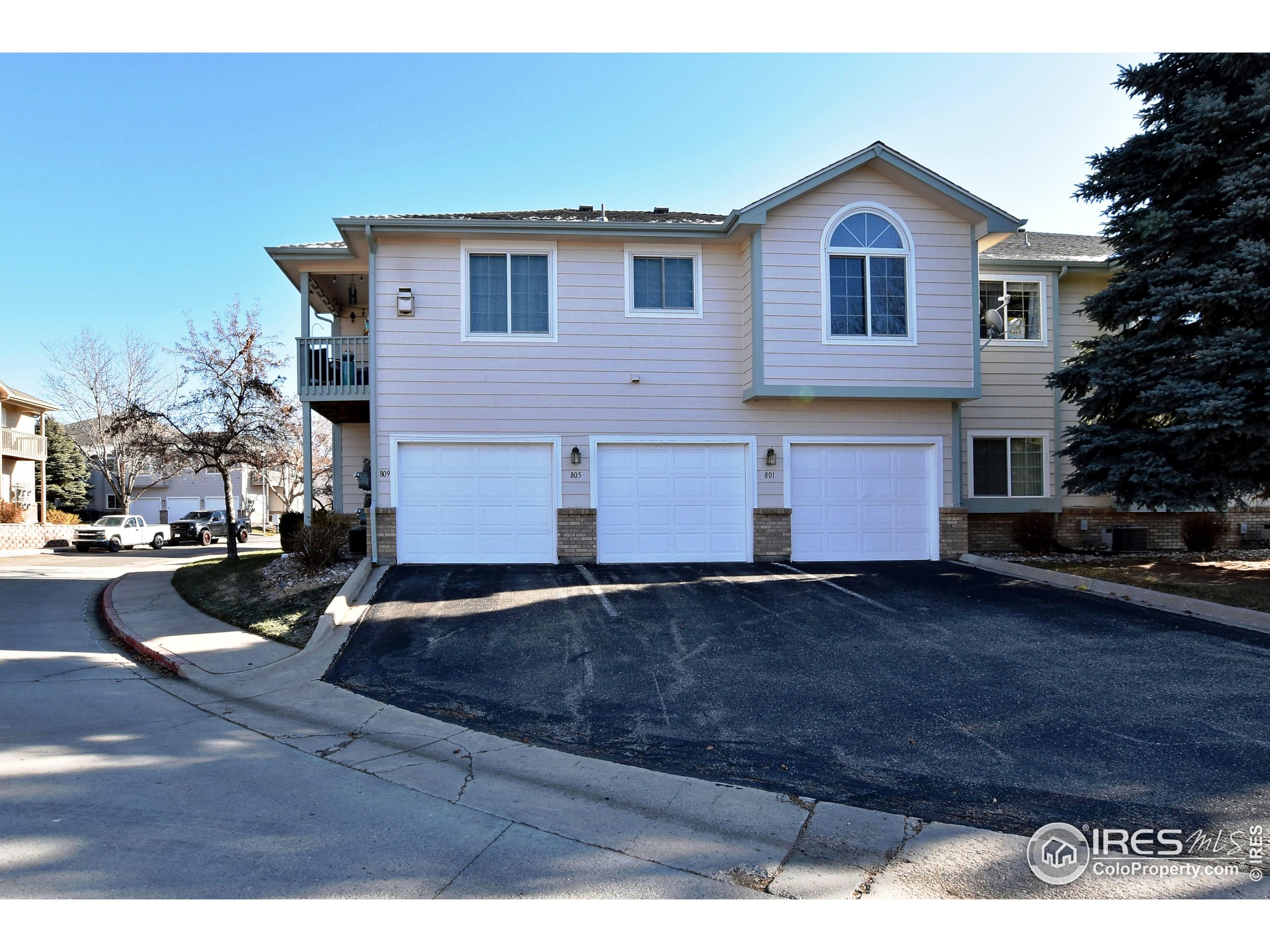 5151 West 29th Street Greeley, CO 80634 - Photo 31 of 40 a front view of a house with a yard