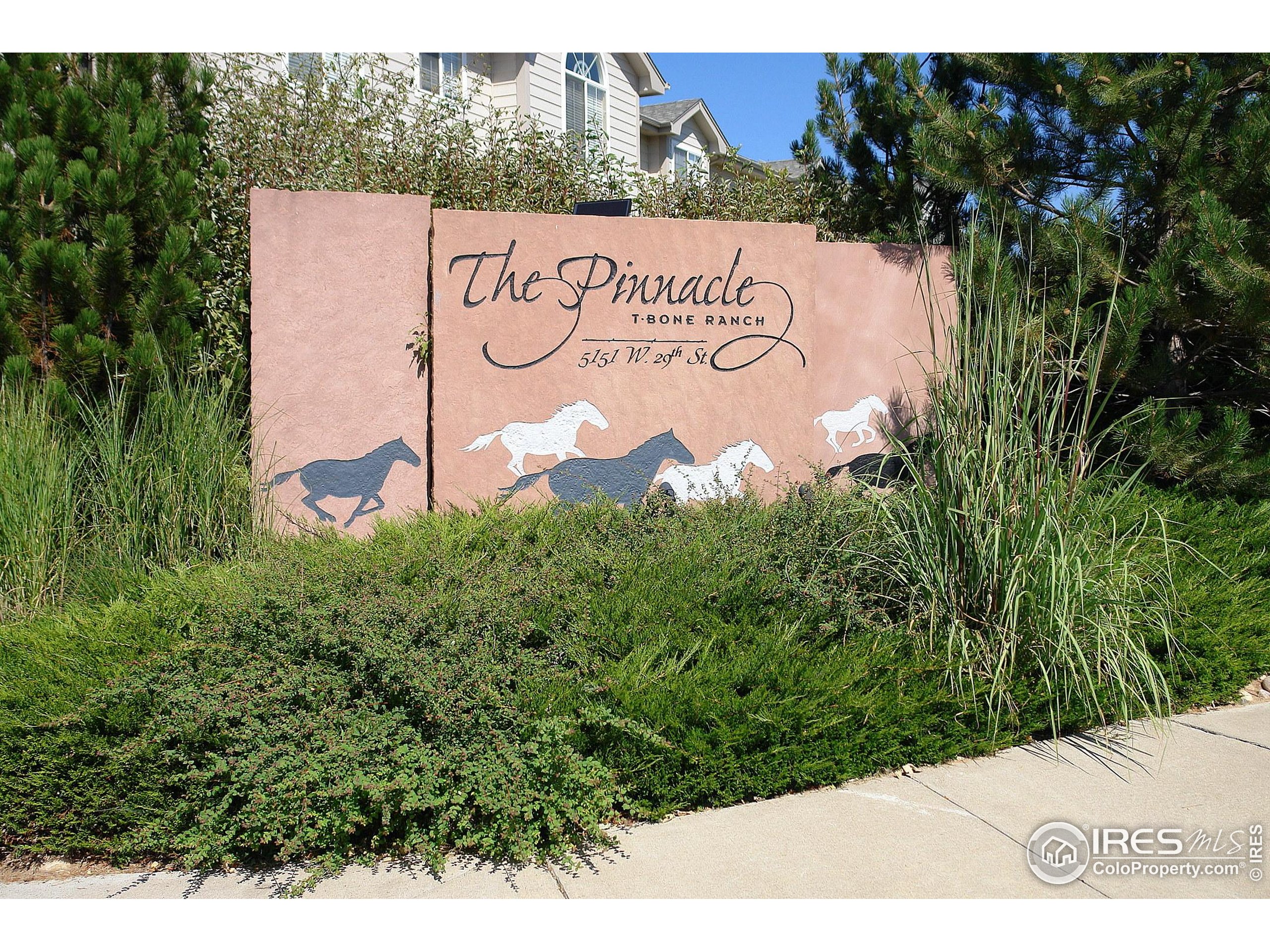 5151 West 29th Street Greeley, CO 80634 - Photo 32 of 40 a sign on the side of the road