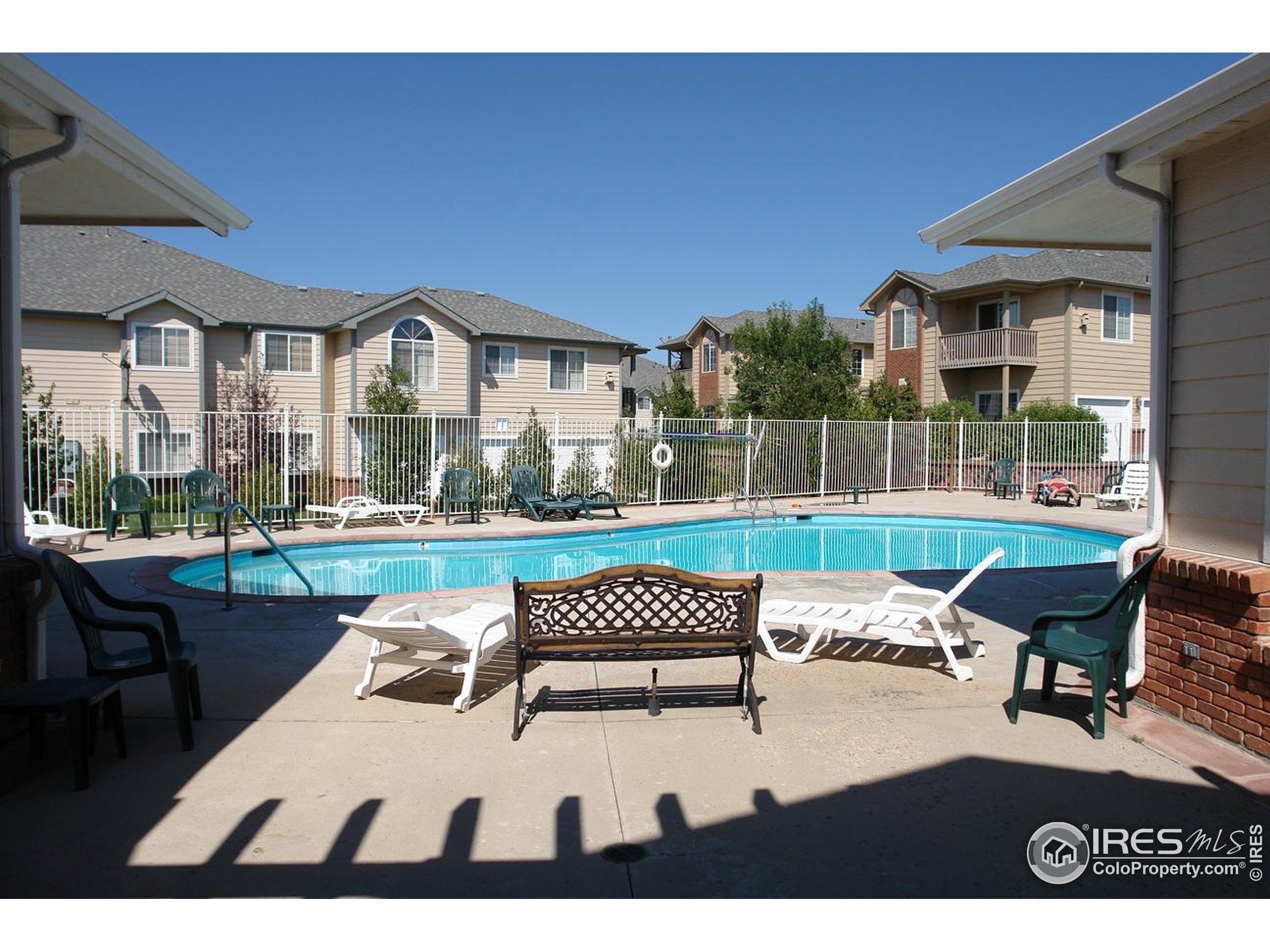 5151 West 29th Street Greeley, CO 80634 - Photo 38 of 40 a view of a patio with a table and chairs