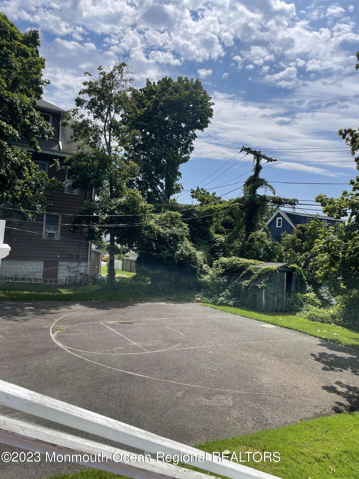 98 Neptune Avenue Deal, NJ 07723 - Photo 10 of 14 a view of a yard and front area