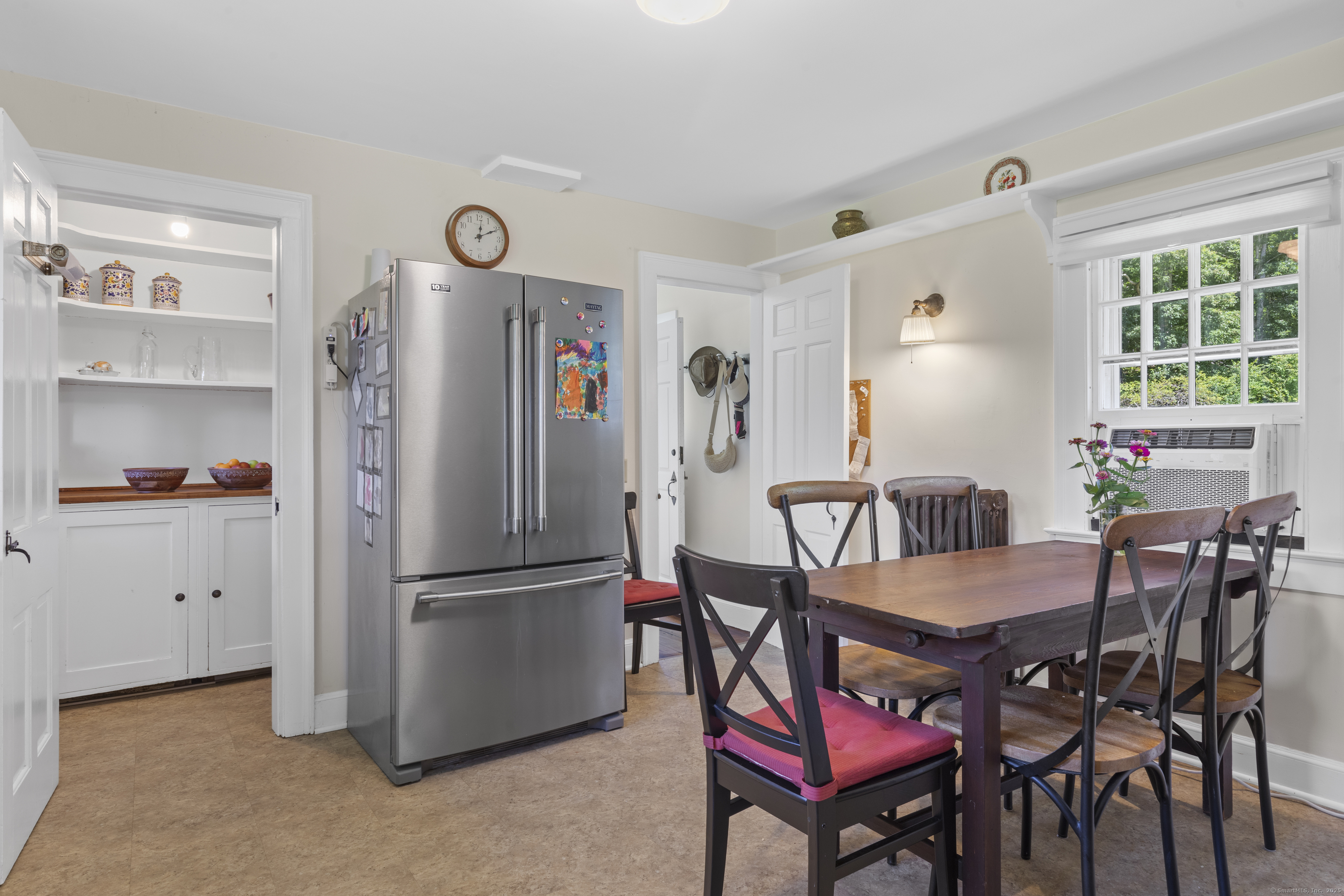90 Duck Hole Road Guilford, CT 06437 - Photo 12 of 38 a view of a dining room with furniture and a window