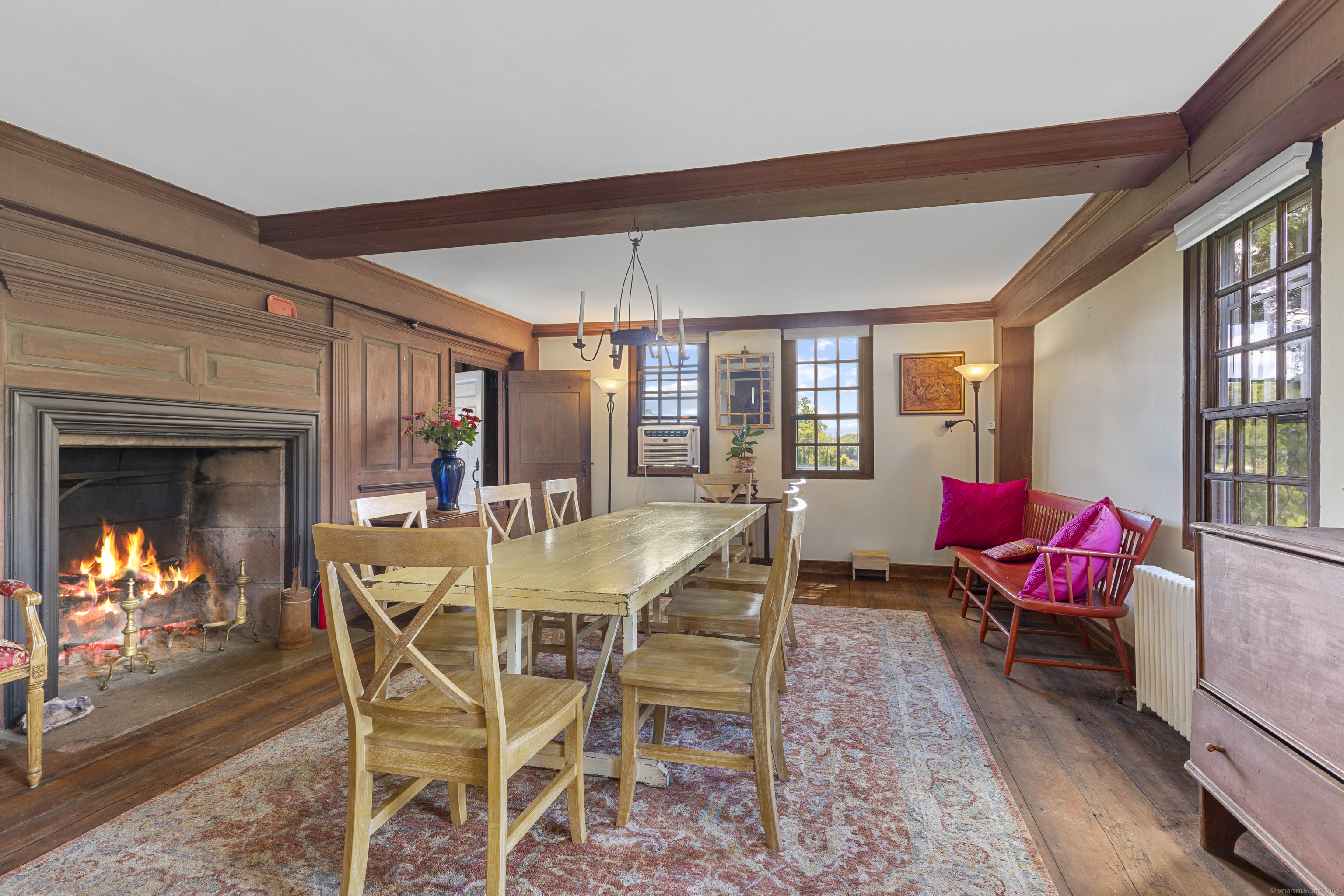 90 Duck Hole Road Guilford, CT 06437 - Photo 16 of 38 a view of a dining room with furniture window and wooden floor