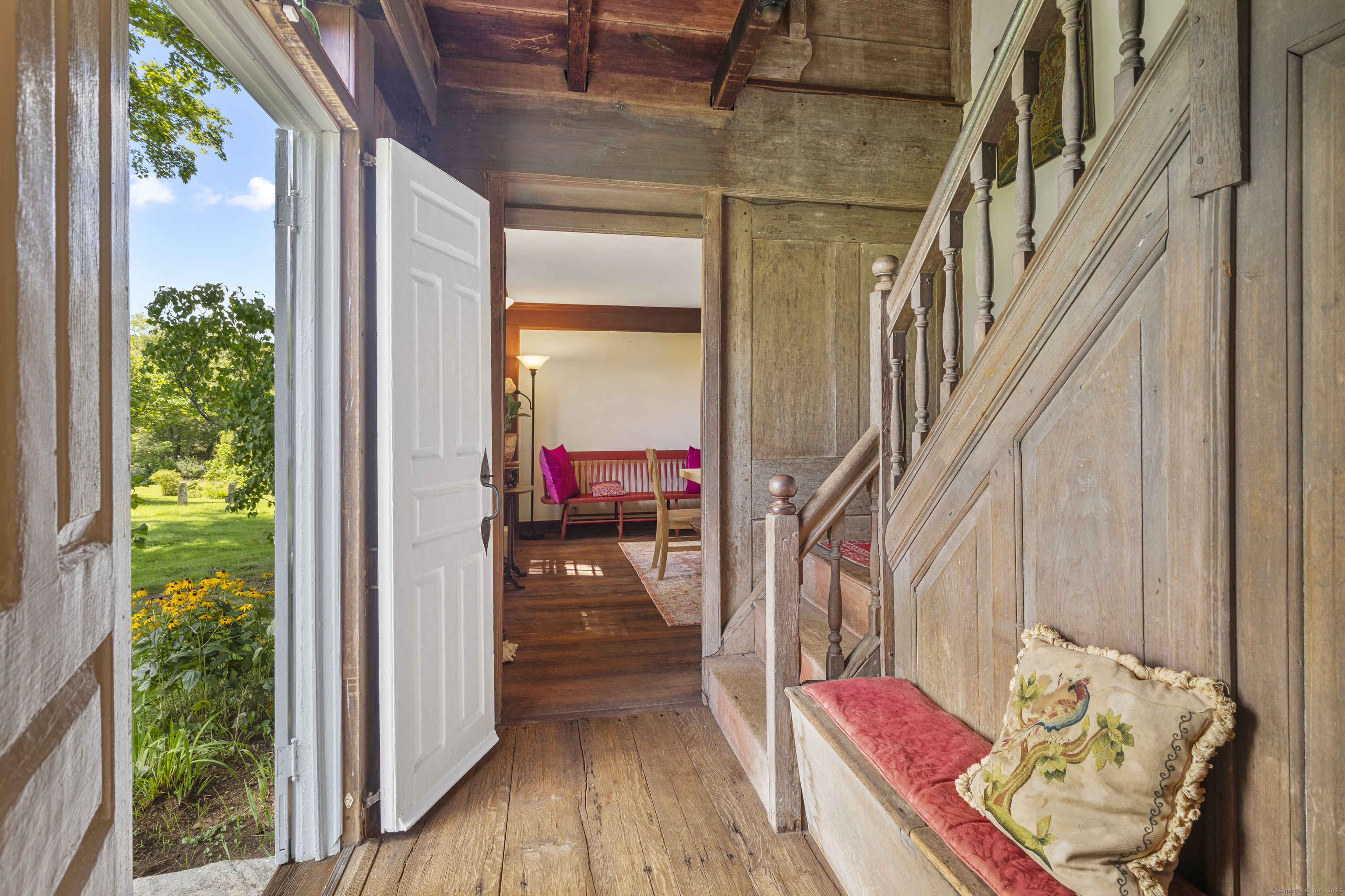 90 Duck Hole Road Guilford, CT 06437 - Photo 10 of 38 a view of a living room and a livingroom with furniture