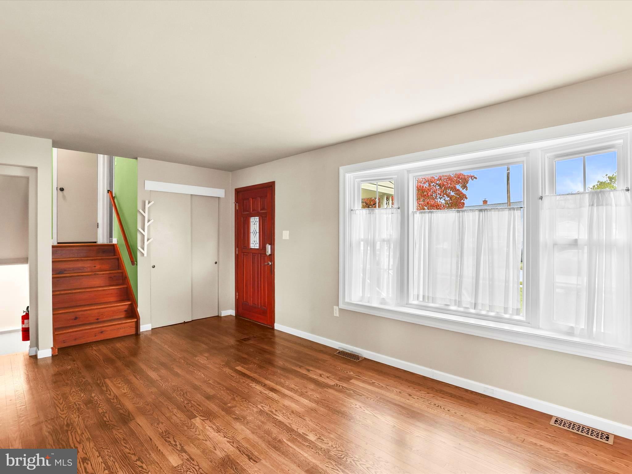 1316 Livingstone Road York, PA 17404 - Photo 14 of 33 wooden floor in an empty room with a window