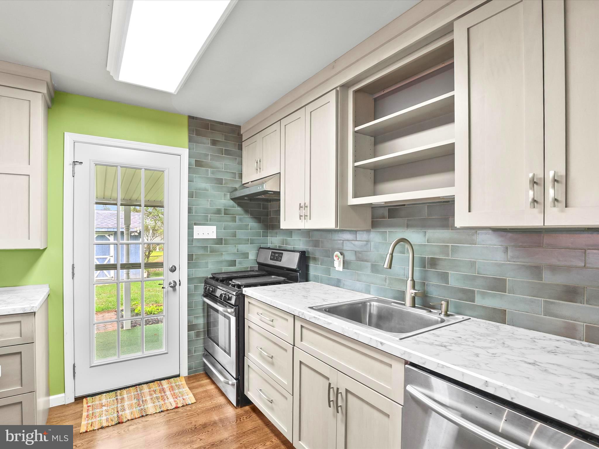 1316 Livingstone Road York, PA 17404 - Photo 18 of 33 a kitchen with a sink stove and cabinets