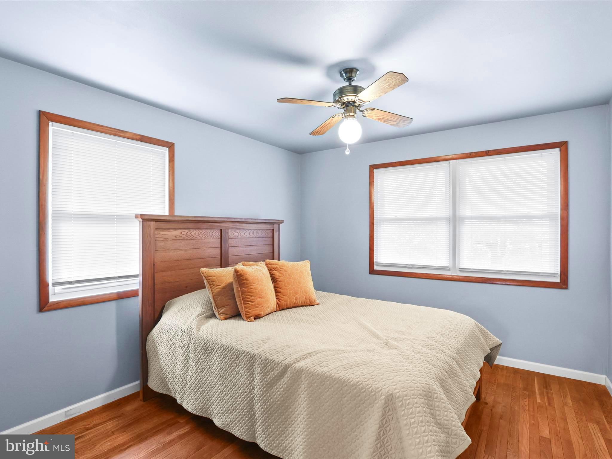1316 Livingstone Road York, PA 17404 - Photo 23 of 33 a bedroom with a bed and wooden floor
