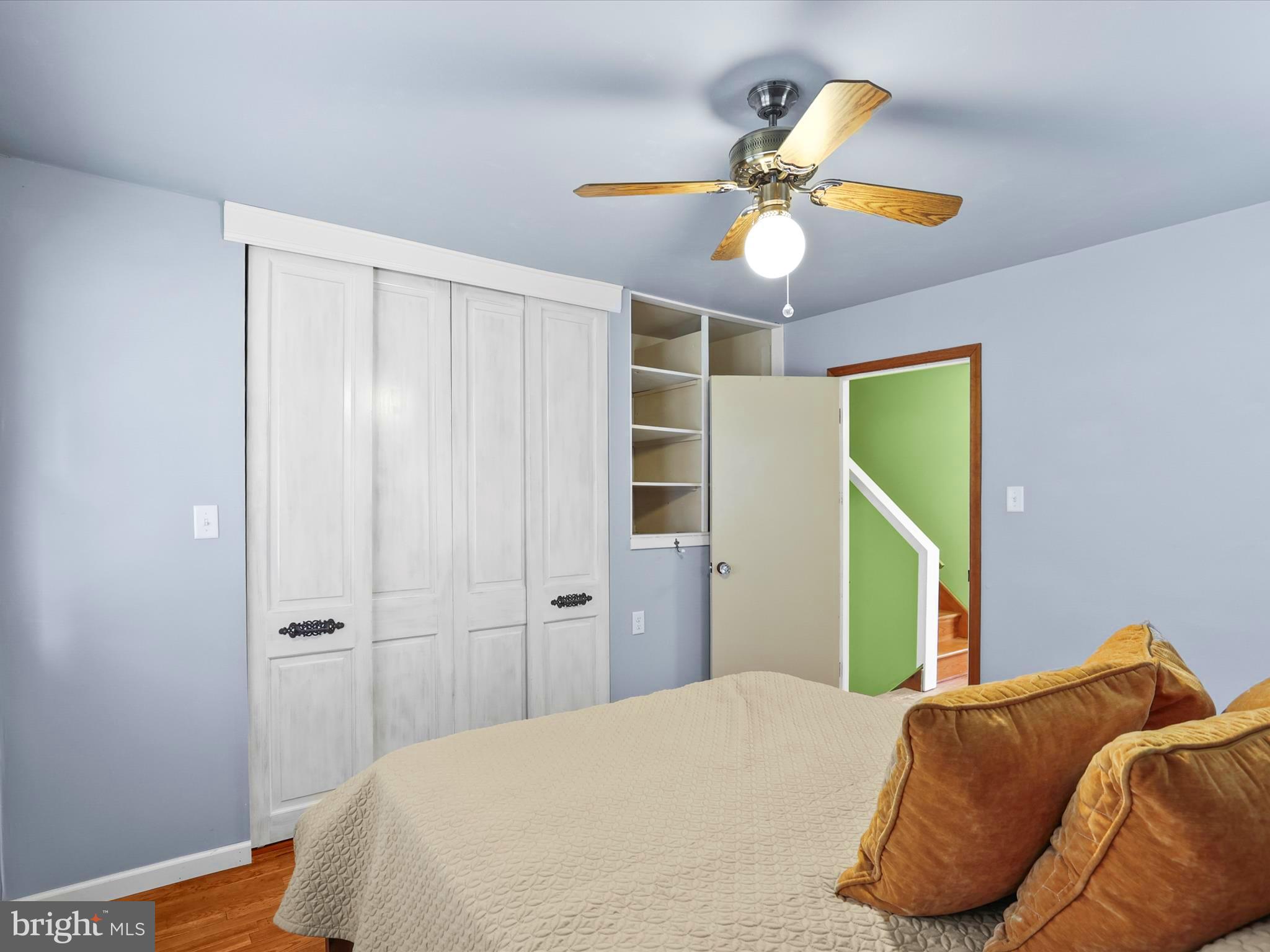 1316 Livingstone Road York, PA 17404 - Photo 24 of 33 a bedroom with a bed and a chandelier
