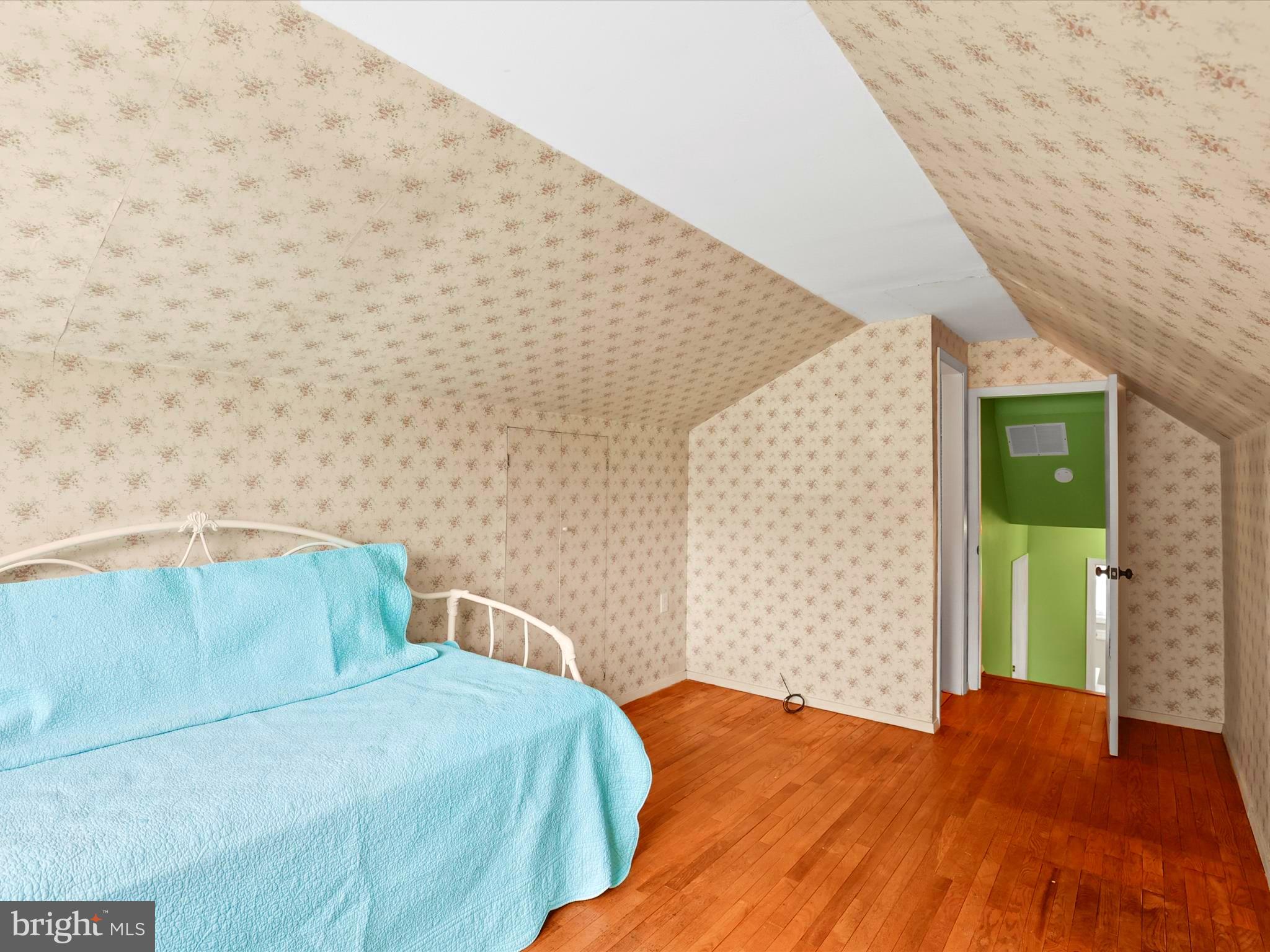 1316 Livingstone Road York, PA 17404 - Photo 28 of 33 a bedroom with a bed and a wall painting