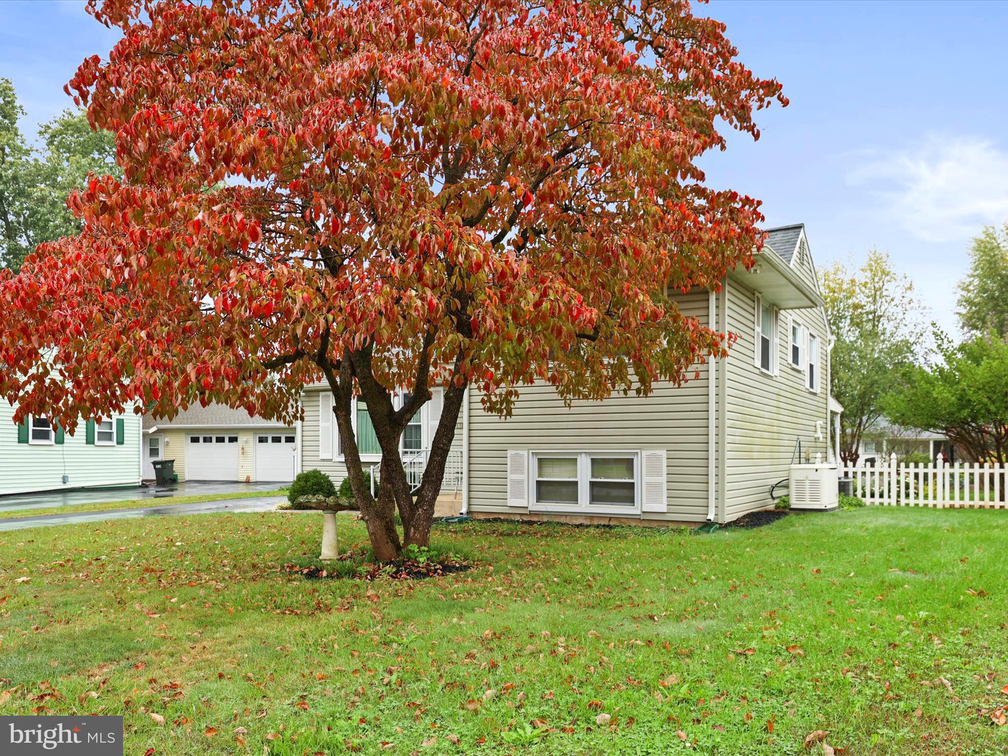 1316 Livingstone Road York, PA 17404 - Photo 3 of 33 a view of a house with a tree in a yard
