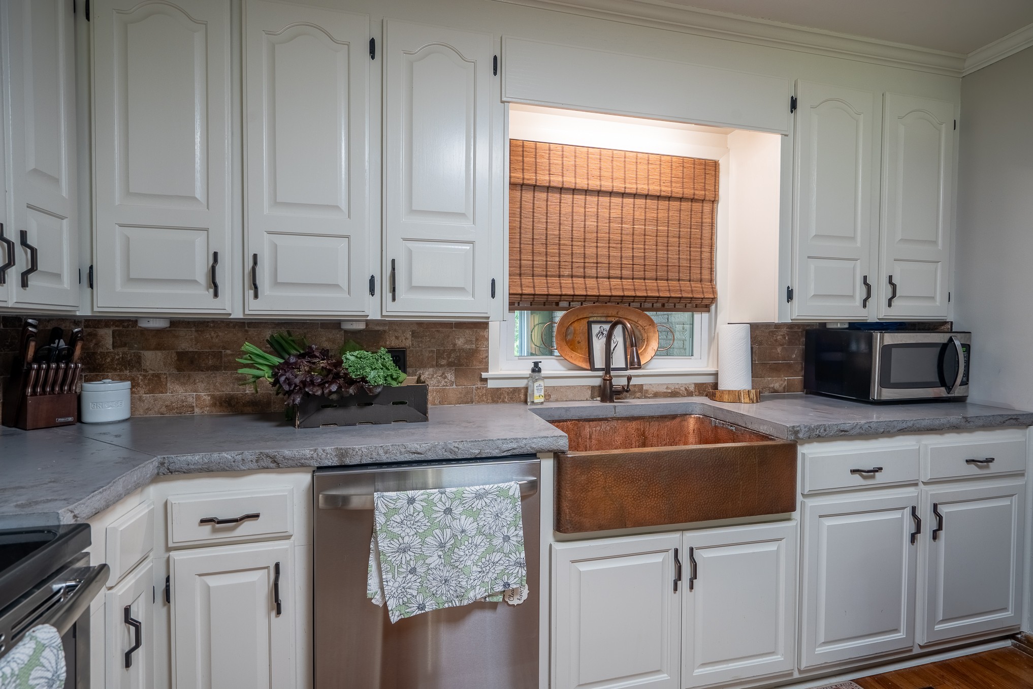 120 Revilo Road Leoma, TN 38468 - Photo 12 of 27 a kitchen with granite countertop a sink a stove and cabinets