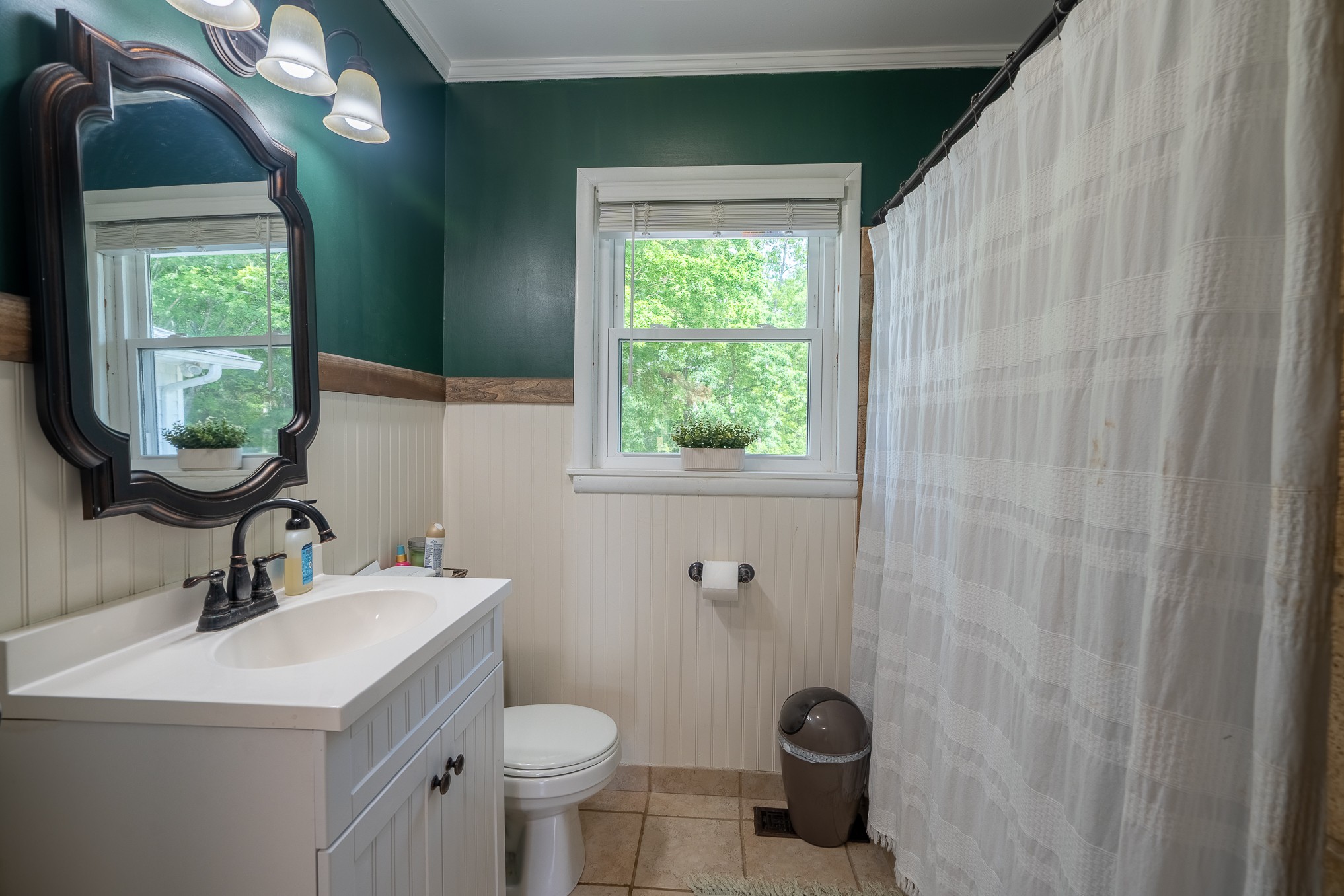 120 Revilo Road Leoma, TN 38468 - Photo 18 of 27 a bathroom with a toilet sink and mirror
