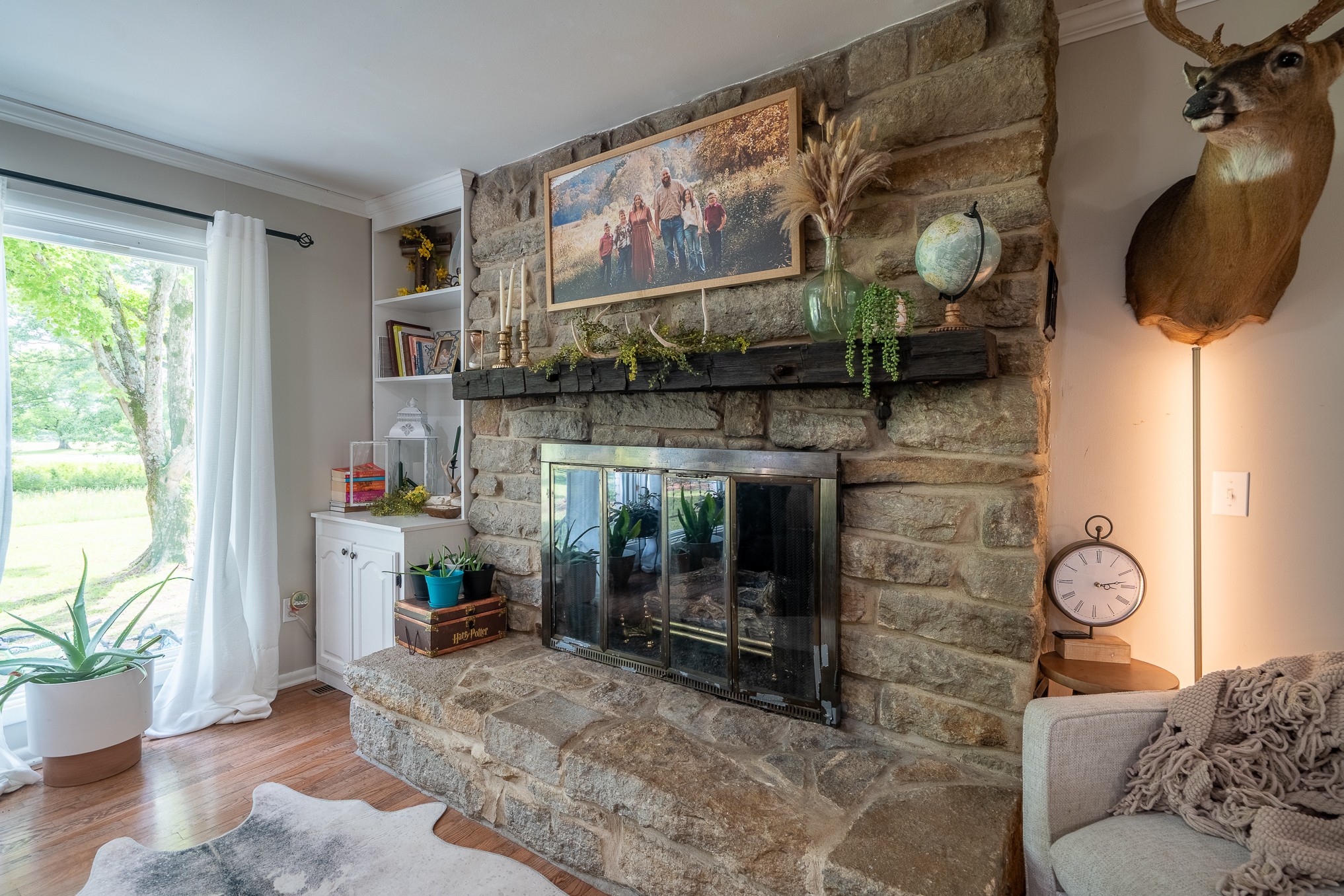 120 Revilo Road Leoma, TN 38468 - Photo 8 of 27 a living room with furniture and a fireplace