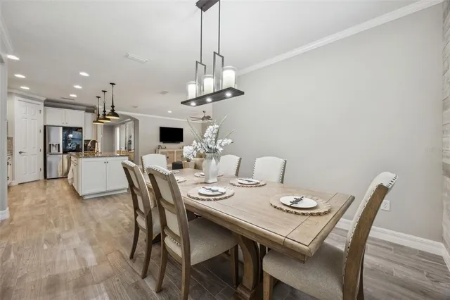 a spacious bathroom with a granite countertop sink mirror and shower