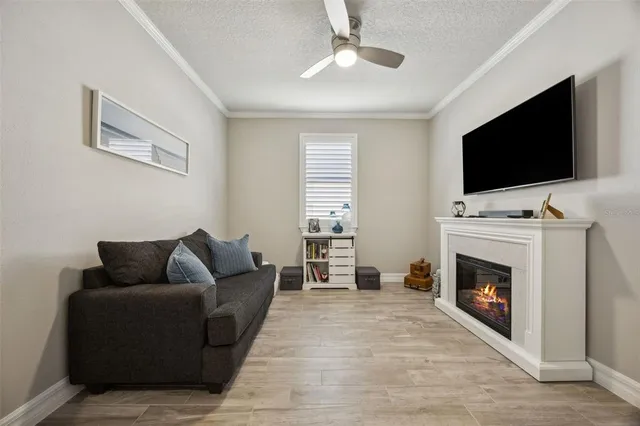 a large bed sitting in a bedroom next to a window