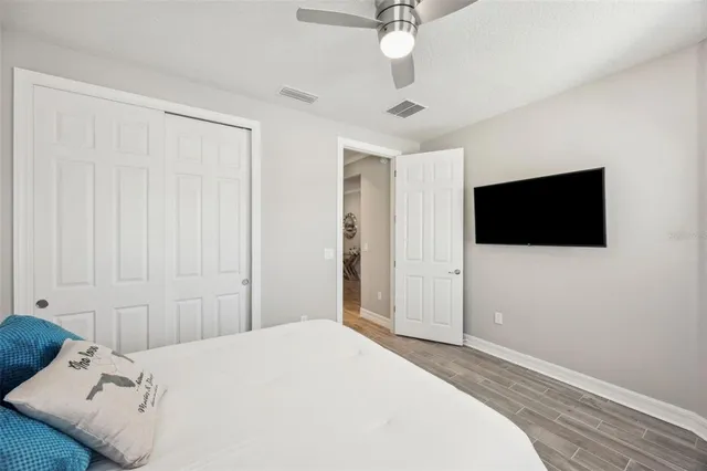 a room with lots of chairs and large windows