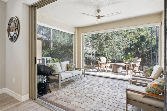 a view of a swimming pool in a back yard