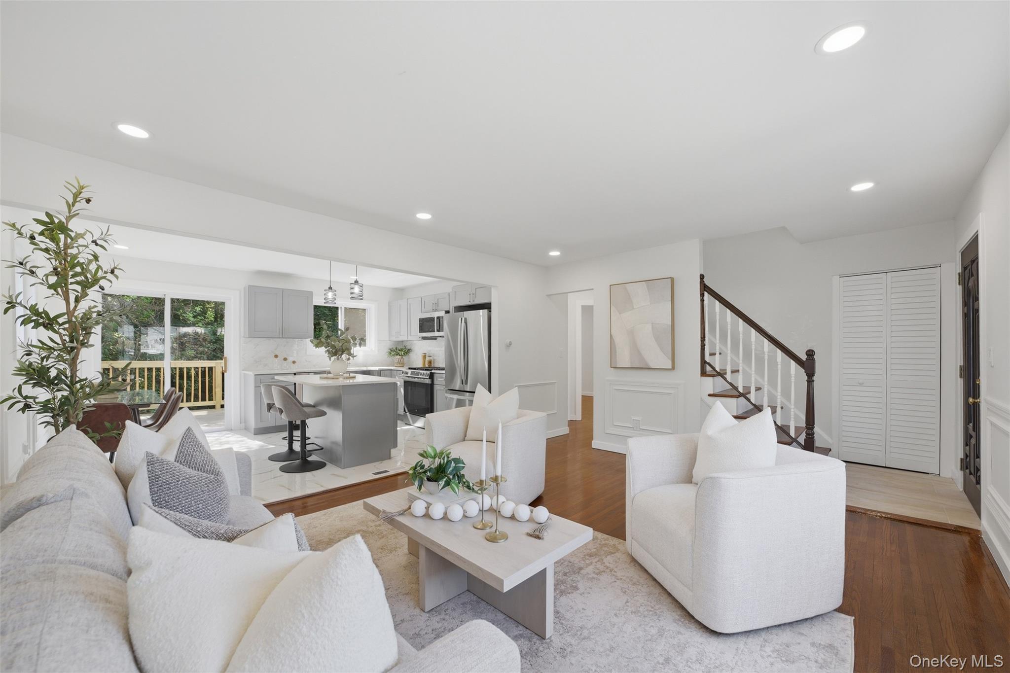 24 Fuller Road Ossining, NY 10562 - Photo 6 of 48 a living room with furniture and a wooden floor