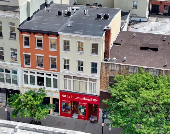a view of a building with a street