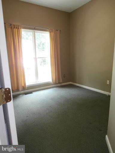 9319 Old Court Road Baltimore, MD 21244 - Photo 12 of 23 an empty room with windows