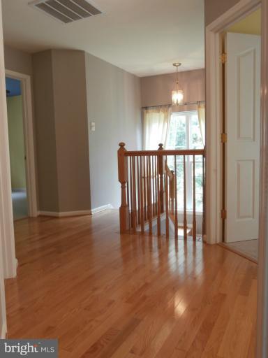9319 Old Court Road Baltimore, MD 21244 - Photo 15 of 23 a view of entryway with wooden floor
