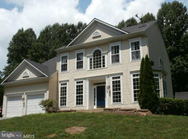 9319 Old Court Road Baltimore, MD 21244 - Photo 18 of 23 front view of a house with a yard