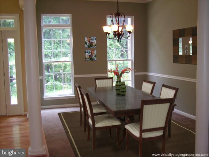 9319 Old Court Road Baltimore, MD 21244 - Photo 10 of 23 a view of a dining room with furniture window and outside view