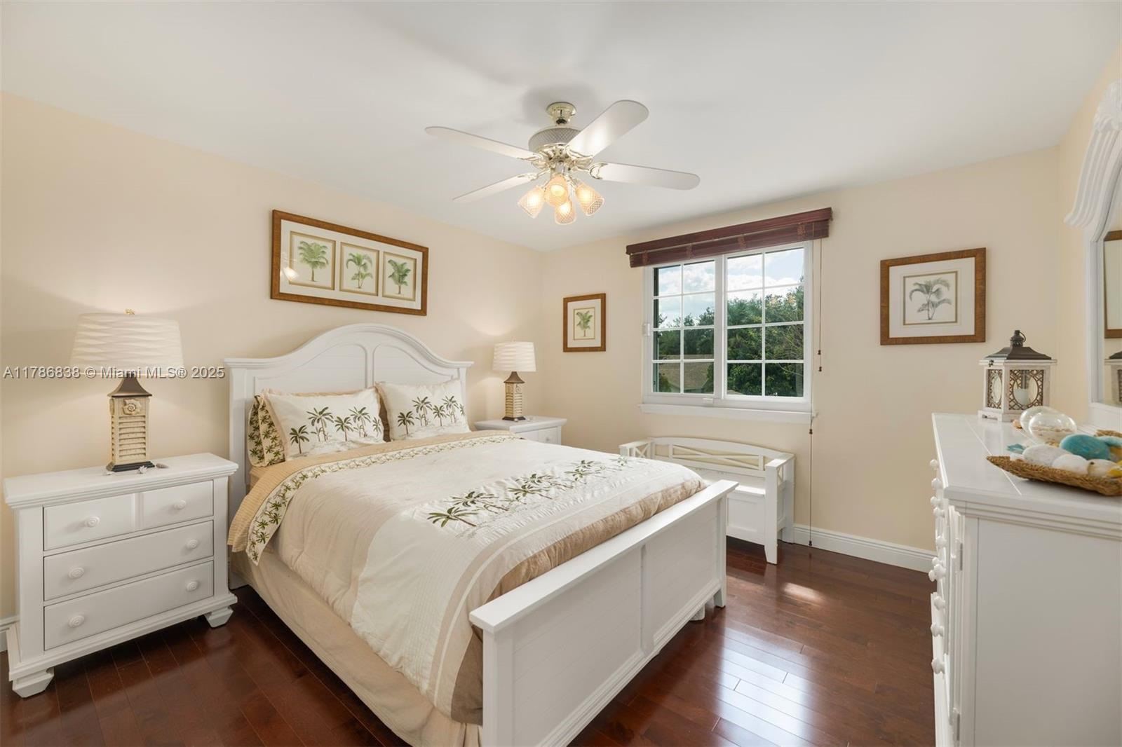 14612 Southwest 153rd Court Miami, FL 33196 - Photo 11 of 26 a bedroom with a bed and a table