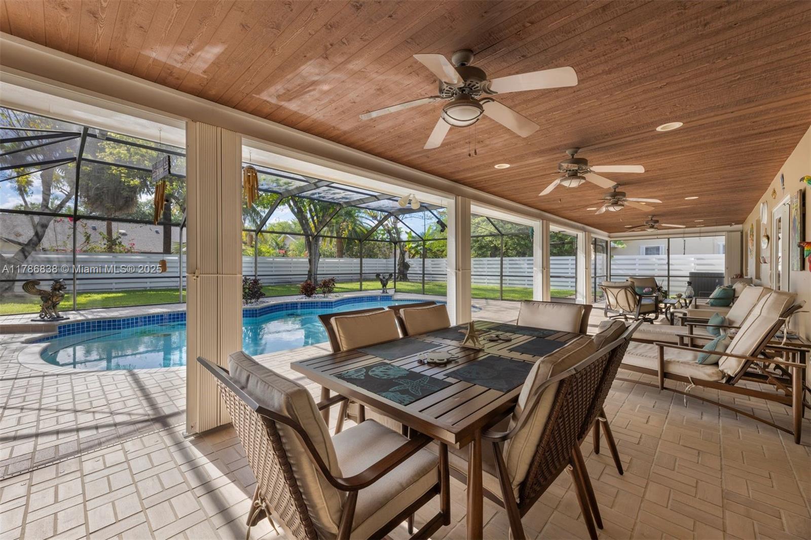 14612 Southwest 153rd Court Miami, FL 33196 - Photo 13 of 26 a view of a dining room with furniture window and outside view