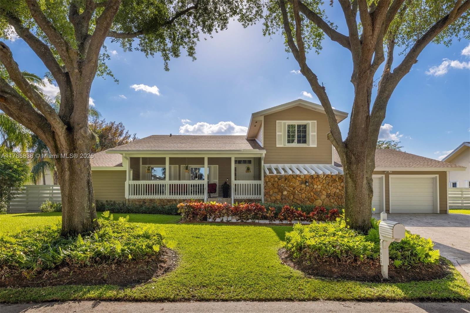 14612 Southwest 153rd Court Miami, FL 33196 - Photo 14 of 26 front view of a house with a yard