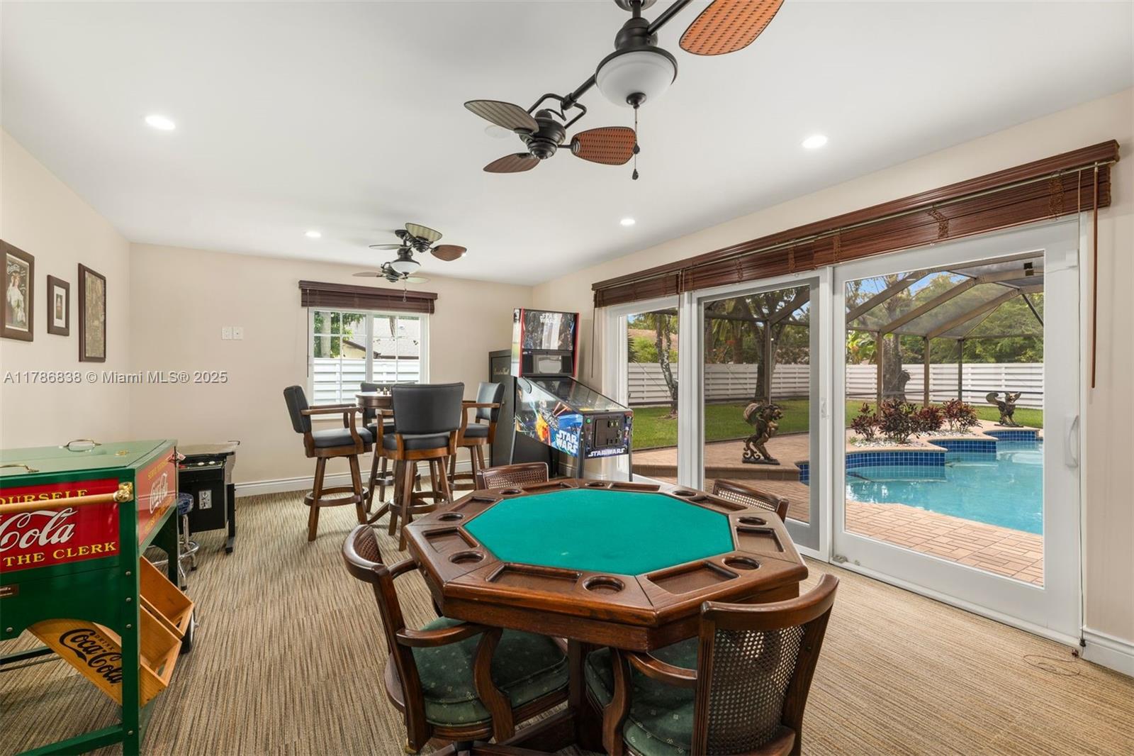 14612 Southwest 153rd Court Miami, FL 33196 - Photo 10 of 26 a living room with furniture and a floor to ceiling window