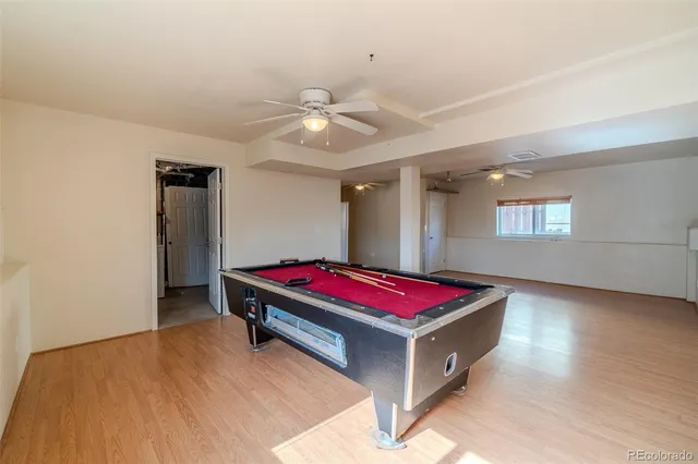 a view of a balcony with wooden floor