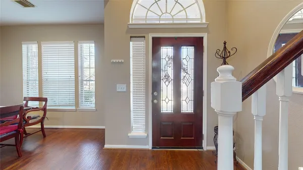 a view of front door with dining room
