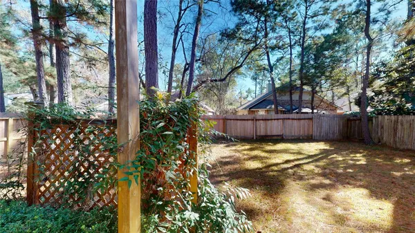 a view of back yard of the house