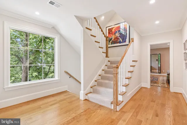 a living room with a couch and a rug