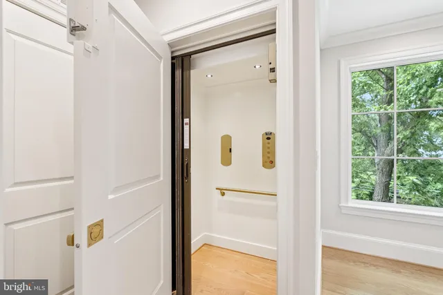 a bedroom with a bed and a desk