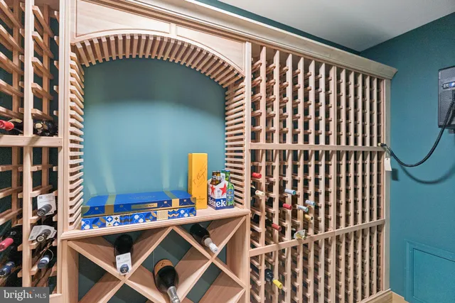 a spacious bathroom with a granite countertop sink mirror and a shower