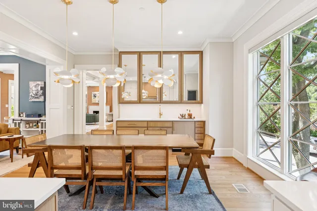 a kitchen with a sink stove and refrigerator