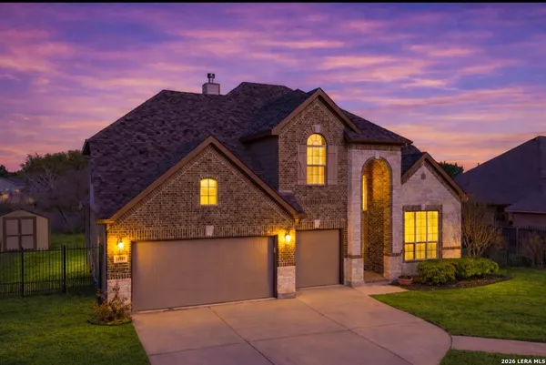 a front view of a house with yard