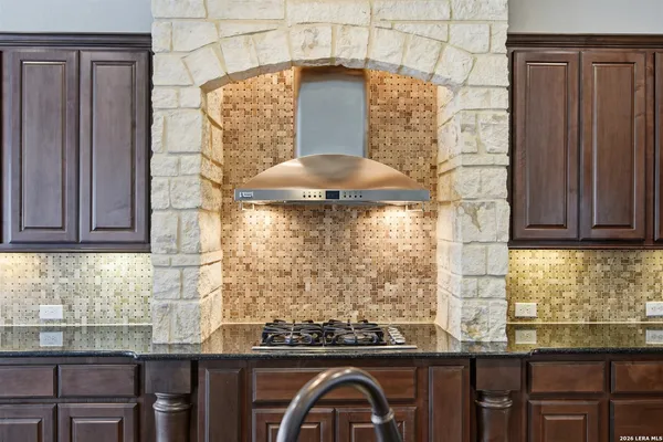 a kitchen with a sink and a window
