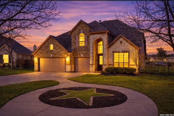 a view of a house with a big yard