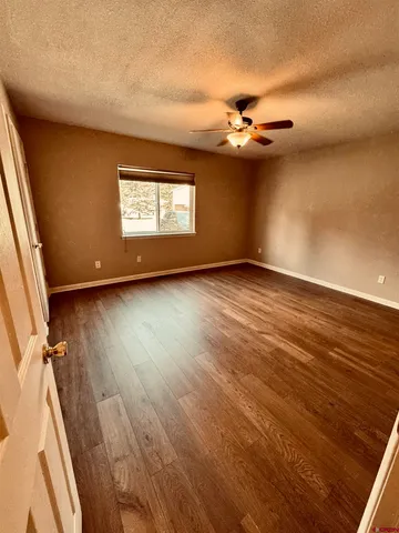 a view of living room with furniture and window