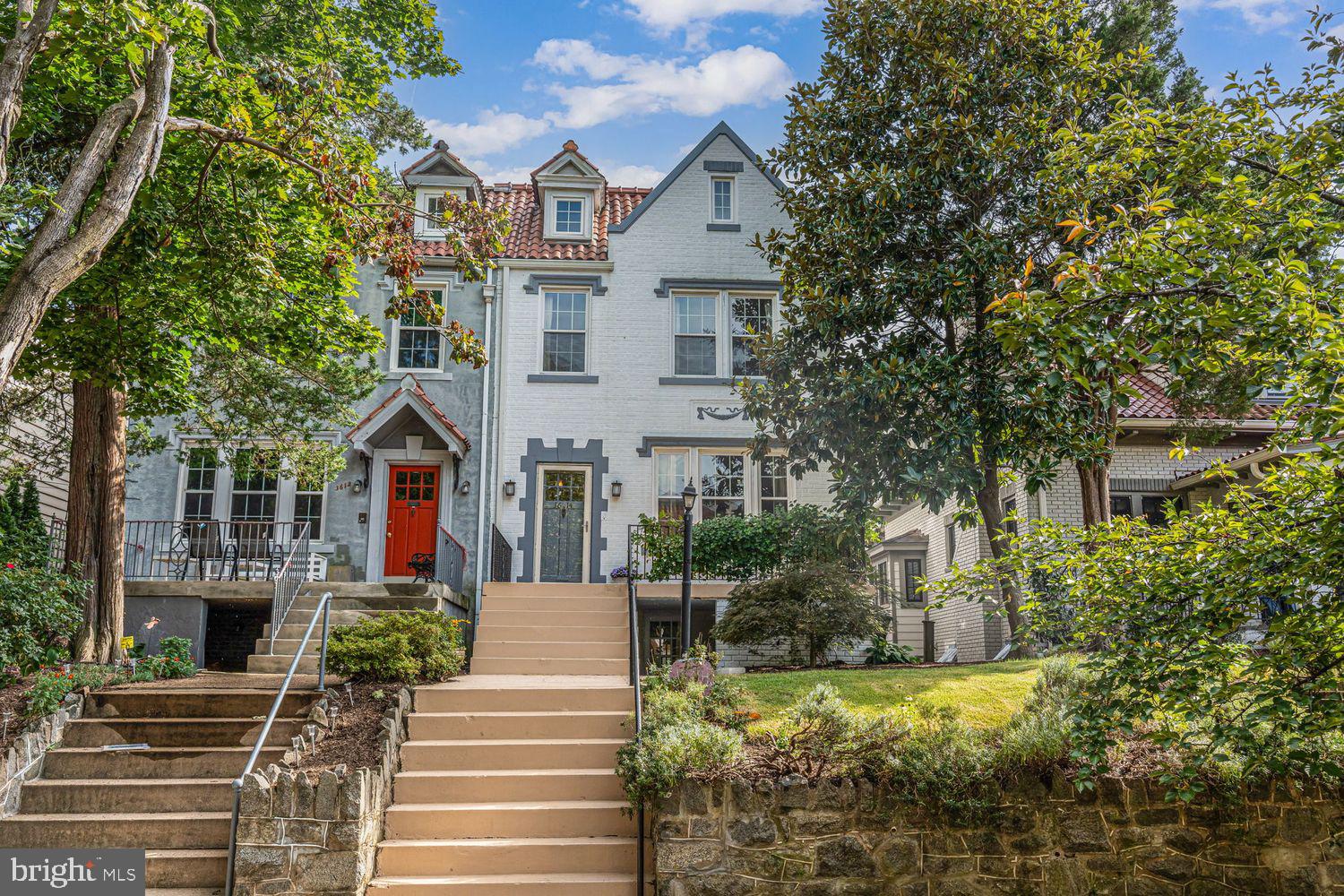3614 Ordway Street Northwest Washington, DC 20016 - Photo 1 of 81 a front view of a house with a yard