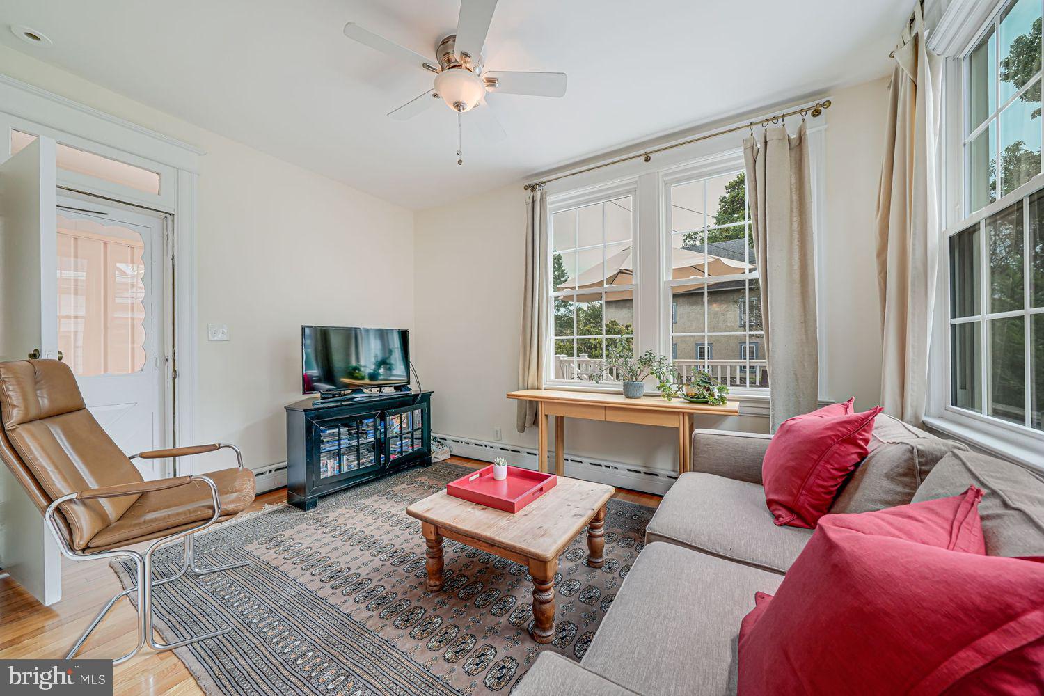 3614 Ordway Street Northwest Washington, DC 20016 - Photo 16 of 81 a living room with furniture a flat screen tv and a window