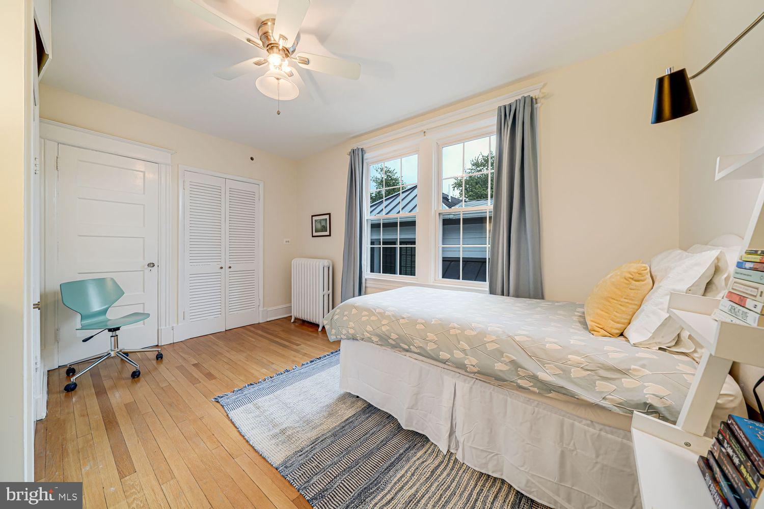 3614 Ordway Street Northwest Washington, DC 20016 - Photo 26 of 81 a bedroom with a bed and wooden floor