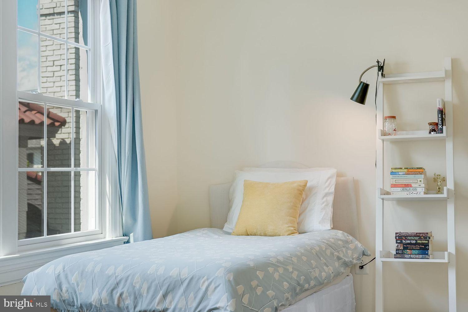 3614 Ordway Street Northwest Washington, DC 20016 - Photo 27 of 81 a bedroom with a bed and a window