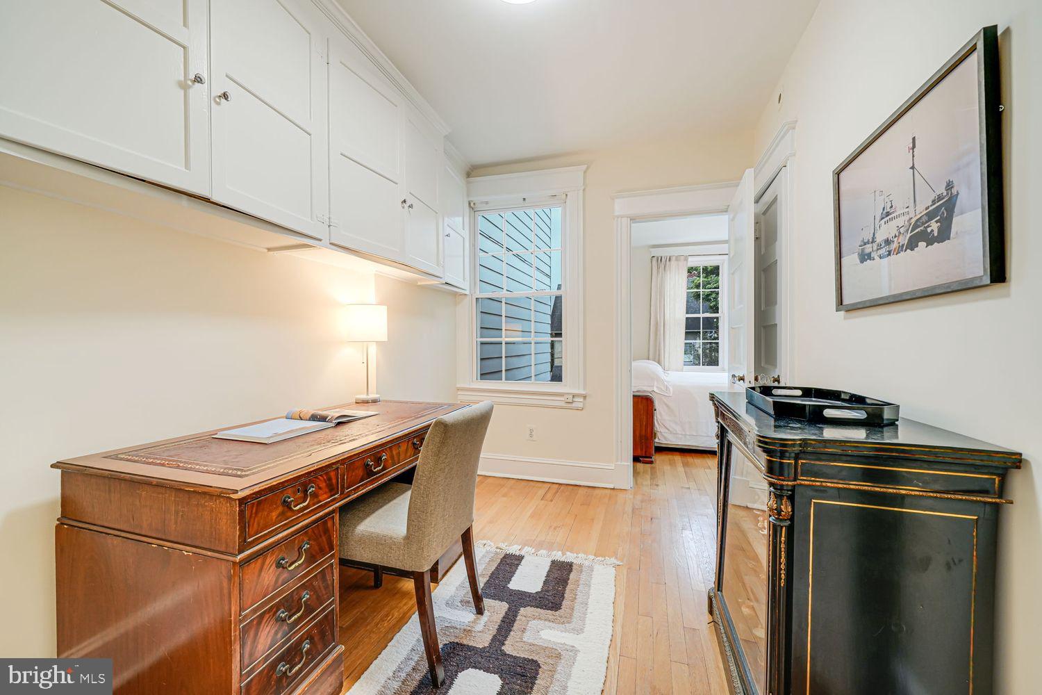 3614 Ordway Street Northwest Washington, DC 20016 - Photo 32 of 81 a view of a dining room with furniture window and wooden floor