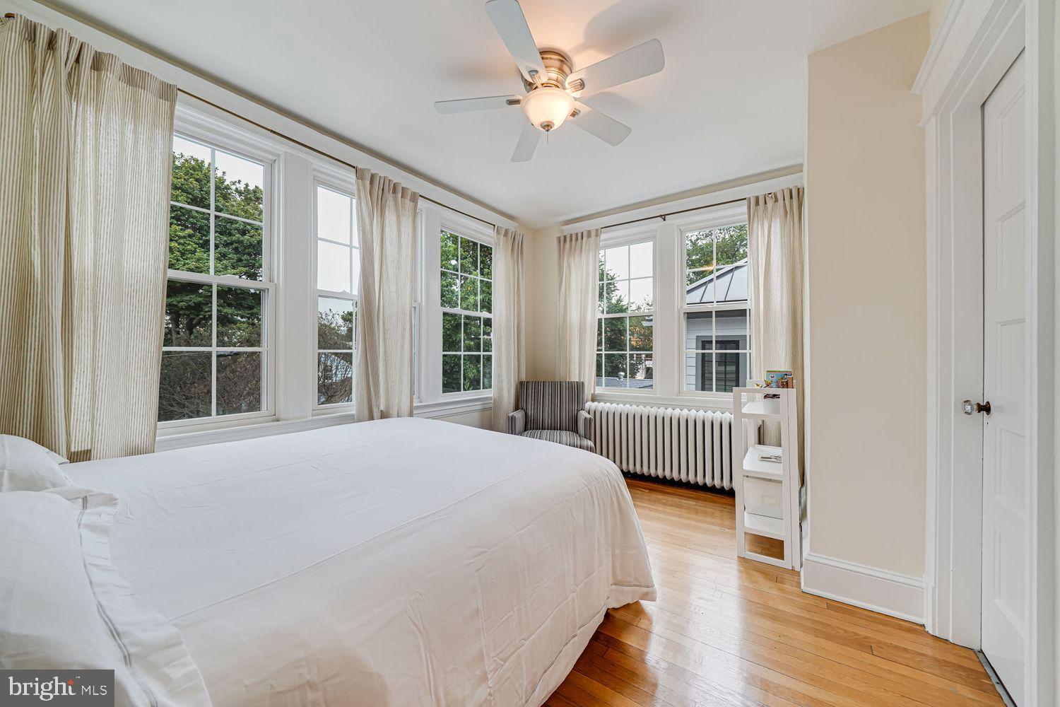 3614 Ordway Street Northwest Washington, DC 20016 - Photo 33 of 81 a bedroom with a bed dresser and a large window