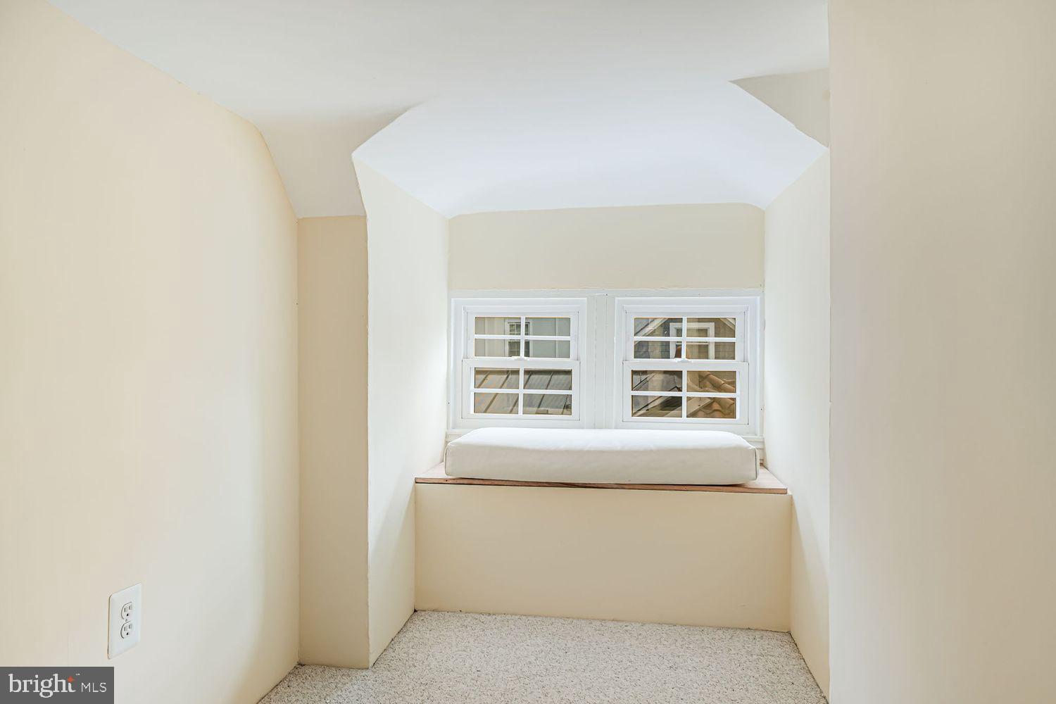 3614 Ordway Street Northwest Washington, DC 20016 - Photo 36 of 81 a view of an empty room with a window