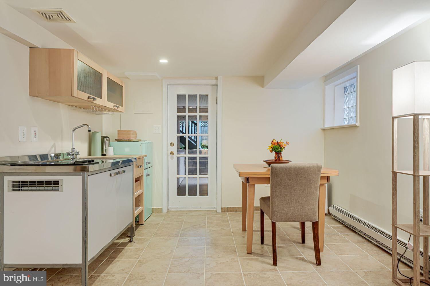 3614 Ordway Street Northwest Washington, DC 20016 - Photo 42 of 81 a kitchen with stainless steel appliances granite countertop a stove and a refrigerator