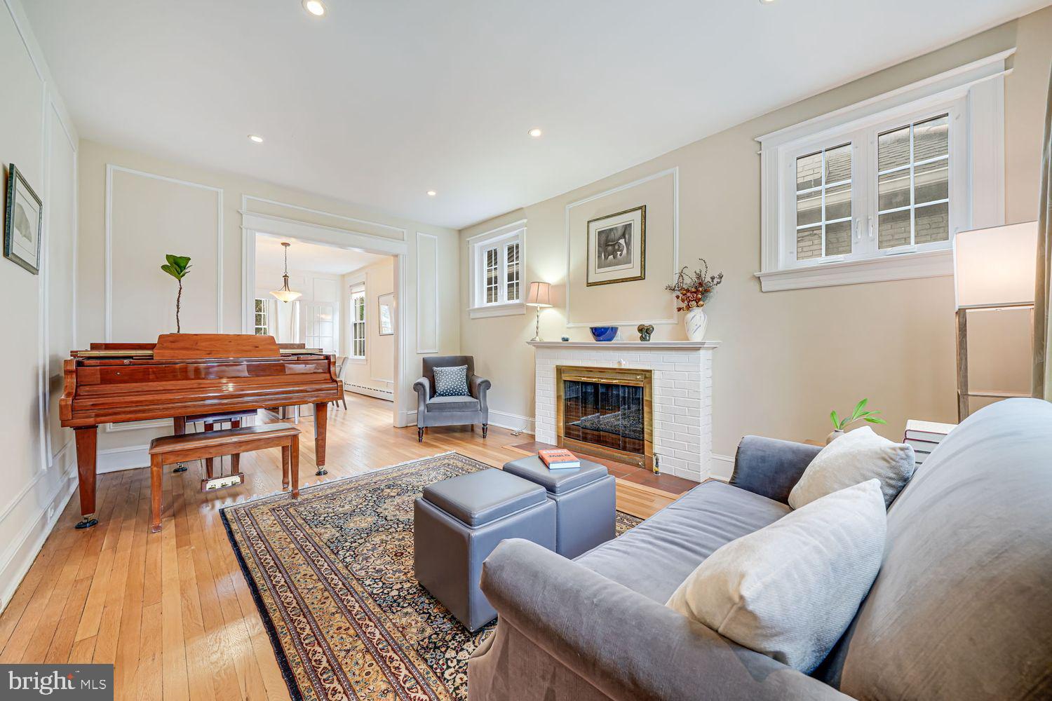3614 Ordway Street Northwest Washington, DC 20016 - Photo 6 of 81 a living room with furniture and a fireplace
